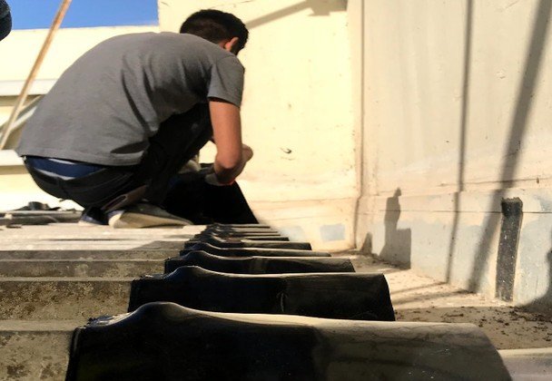 Roof works photo — Juma Al Majid