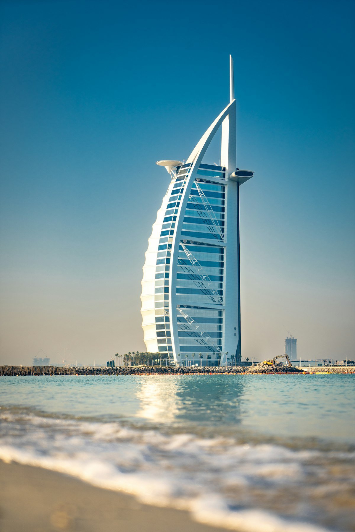 Burj Al Arab and Dubai coastline — city the company is based in