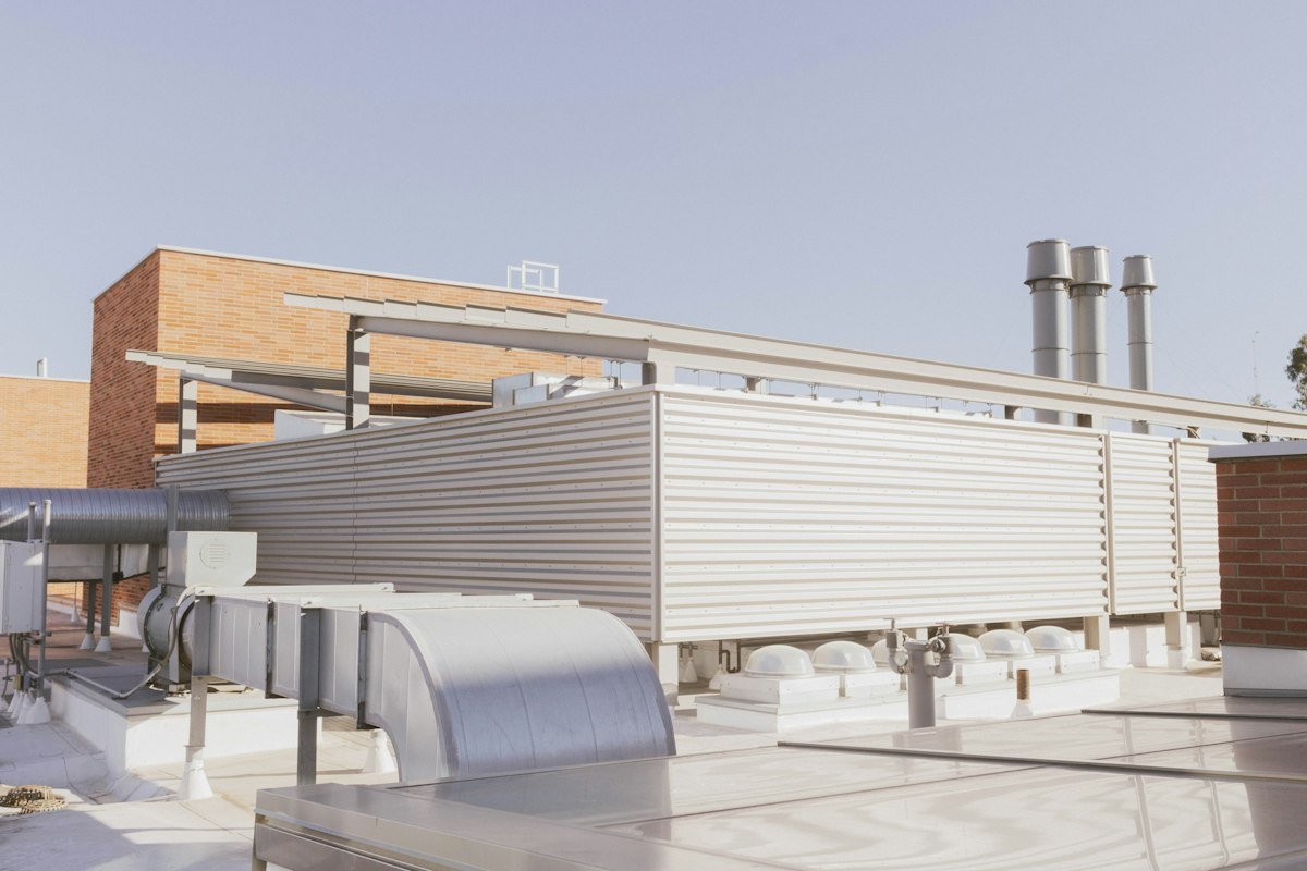 Coated flat roof waterproofing on a commercial building